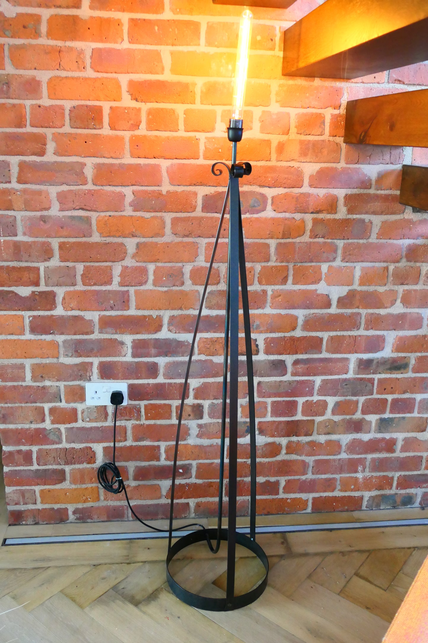 Grass shade floor lamp on antique bronze base