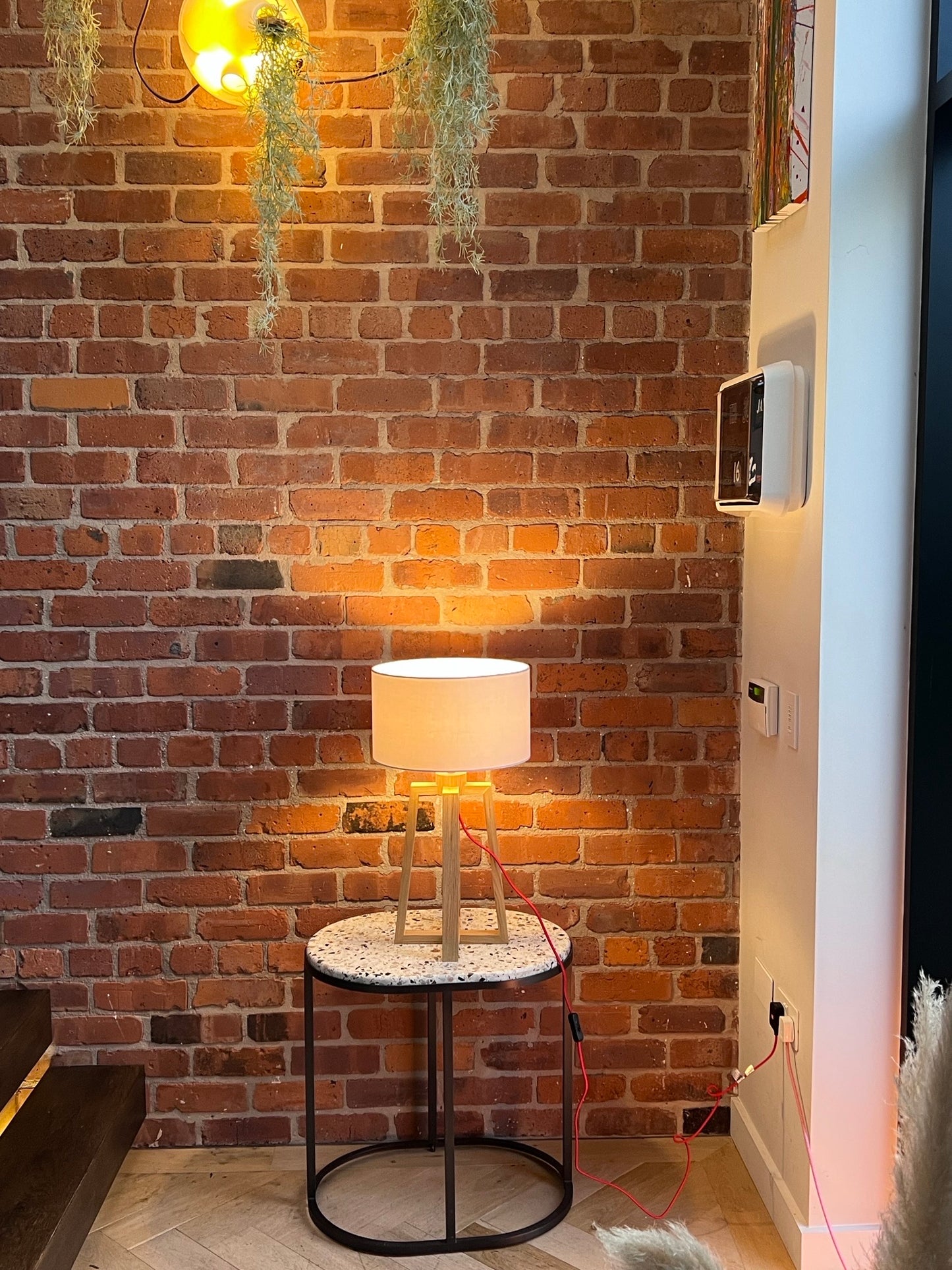 Wooden pyramid table lamp with linen shade